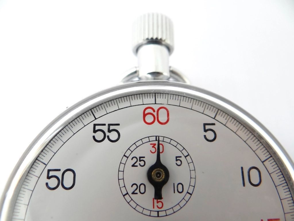 Close view of a mechanical stopwatch dial